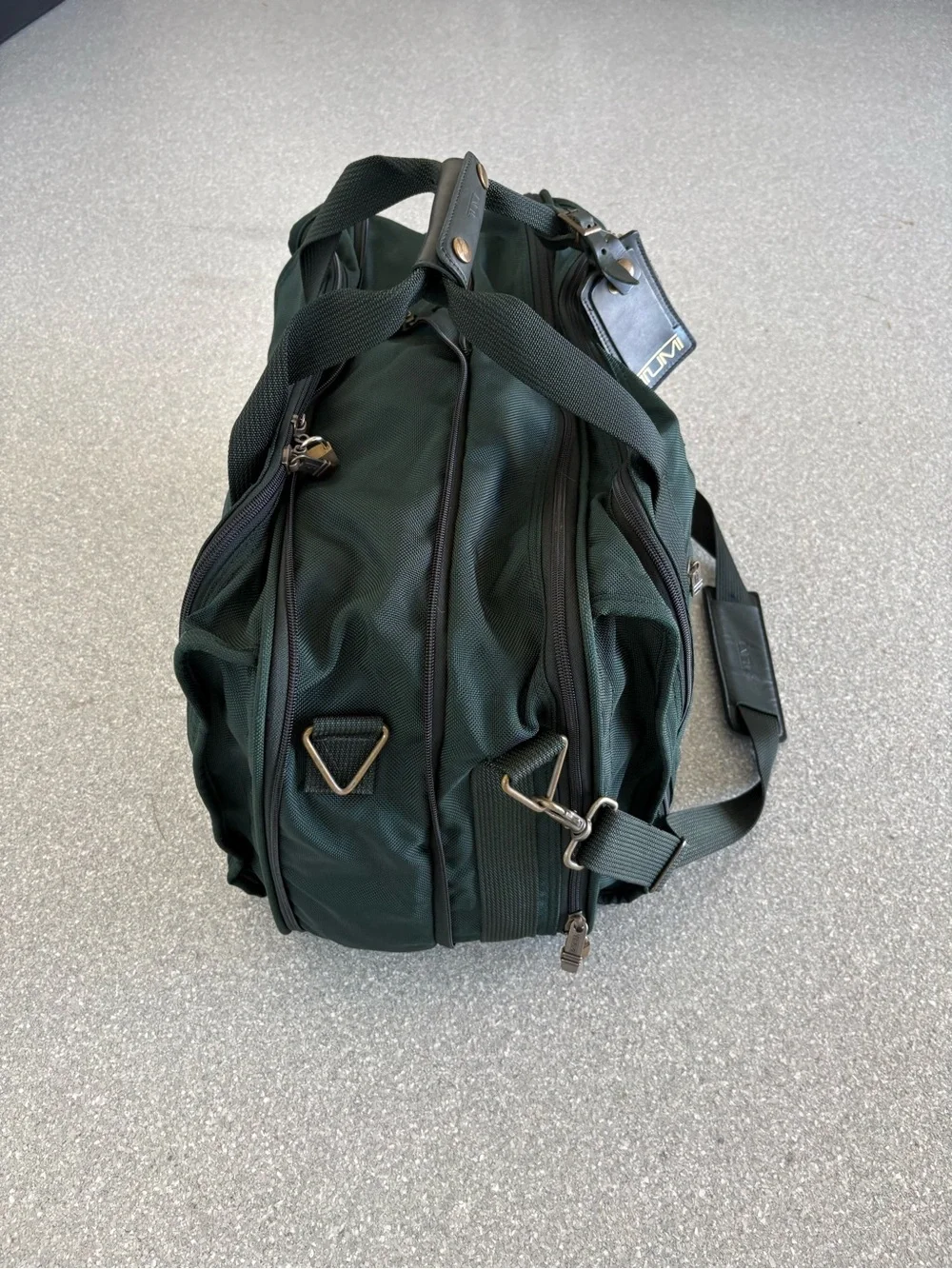 TUMI double expansion carry on travel bag, 22”wide, 10”deep, 15”tall with locks